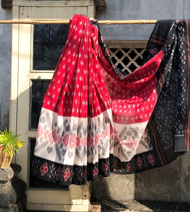 Cotton Ikkat Saree With Black Ikkat Woven Palla & Border On Both Sides.