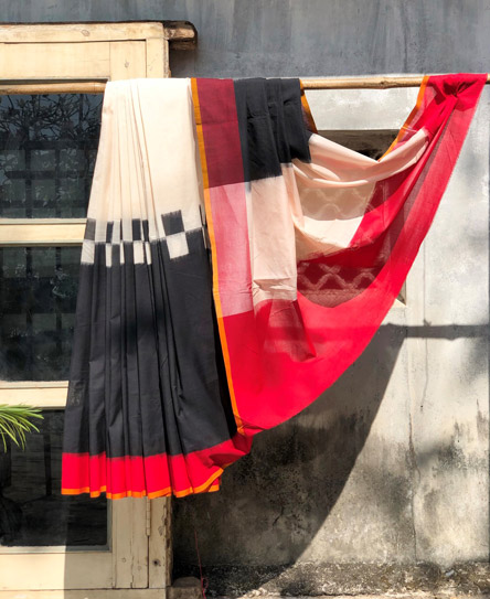 White & Black Ikkat Saree With Shaded Palla & Red Border