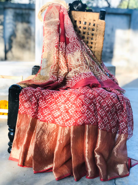 Rust Shaded Kota Silk Saree With Big Golden Border.