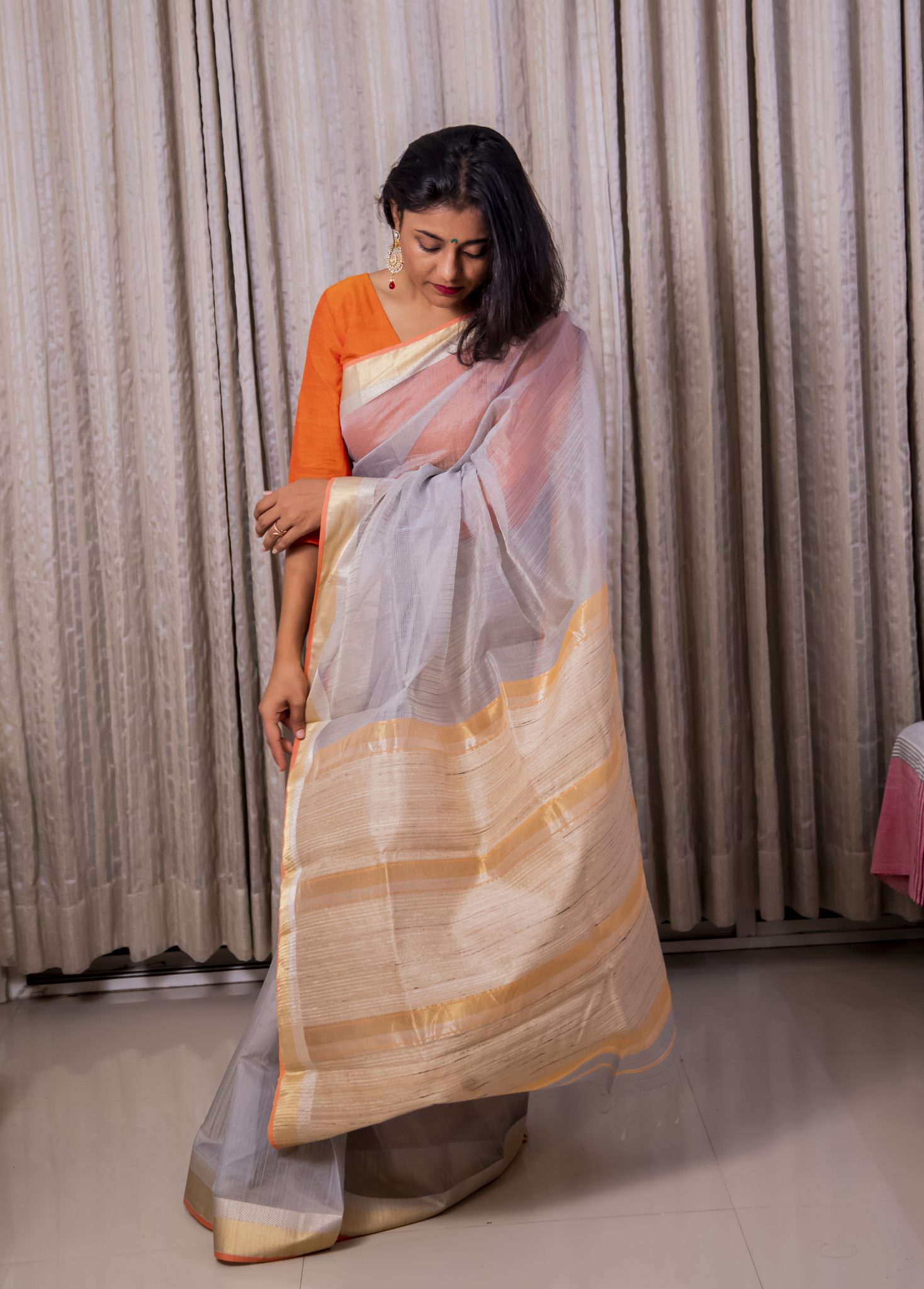 Grey and orange coloured handwoven cotton silk maheshwari saree with tussar silk woven palla