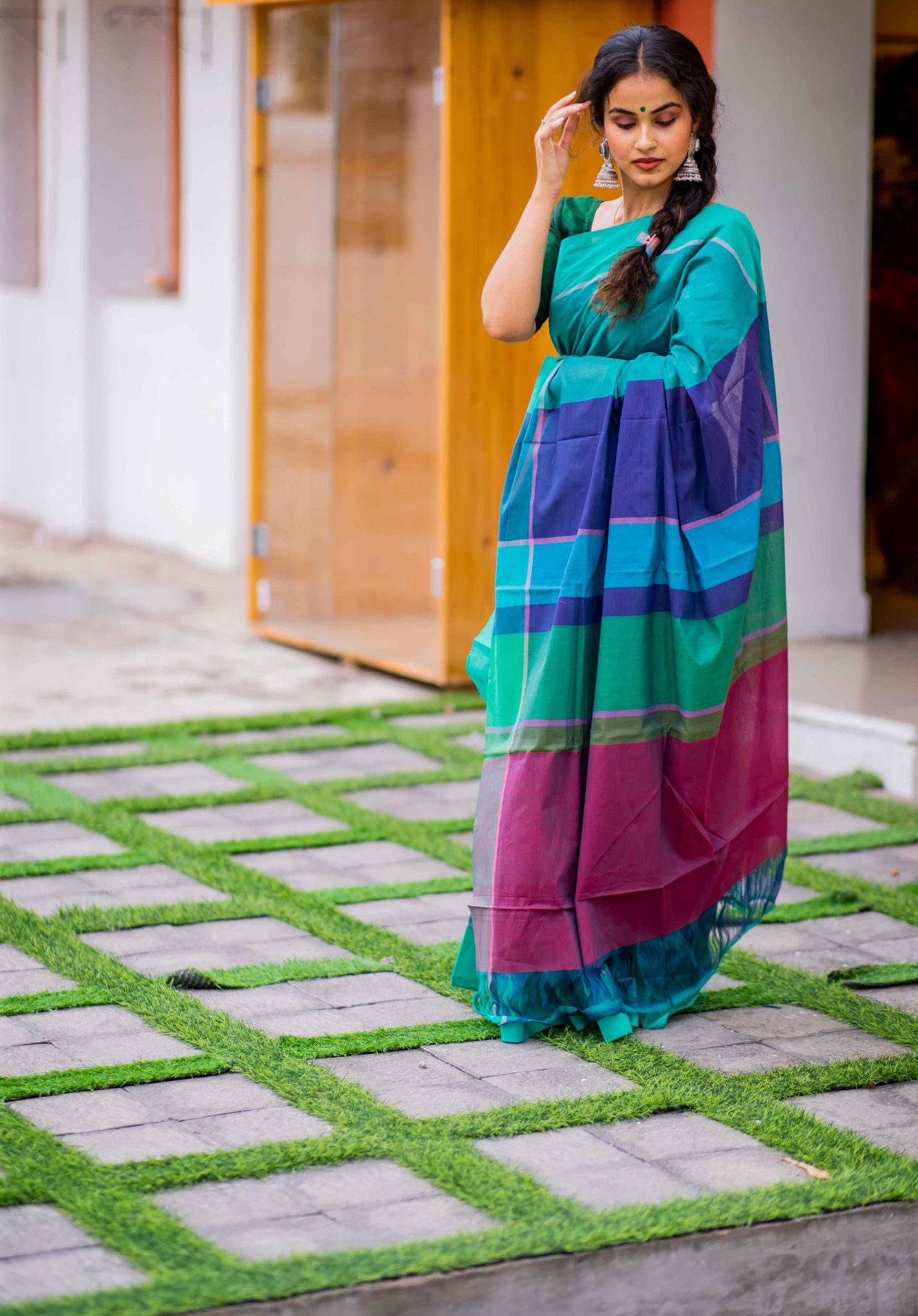 Teal blue coloured handwoven mangalgiri saree with woven multicoloured stripped palla