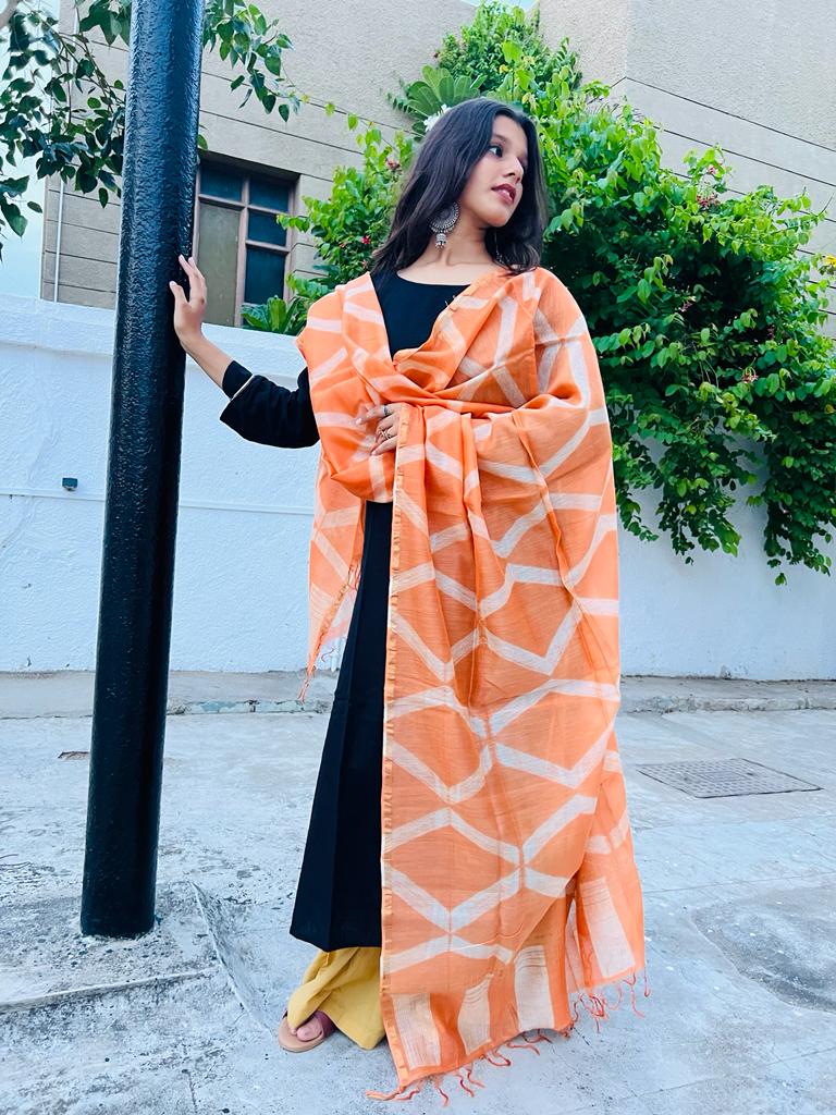 Light orange coloured with shibori chanderi dupatta with tassels