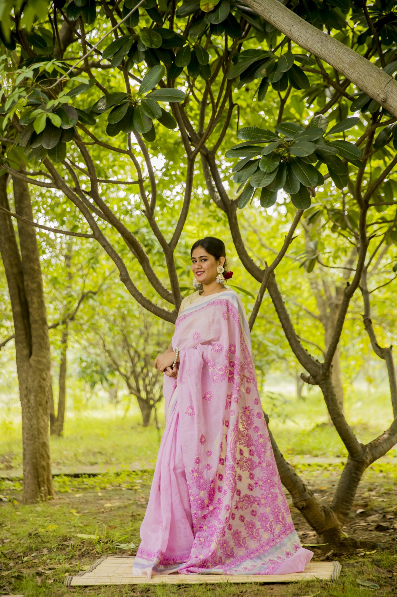 Light pink coloured hand embroidered Lucknowi chikankari kota saree with Brocade border and heavy palla